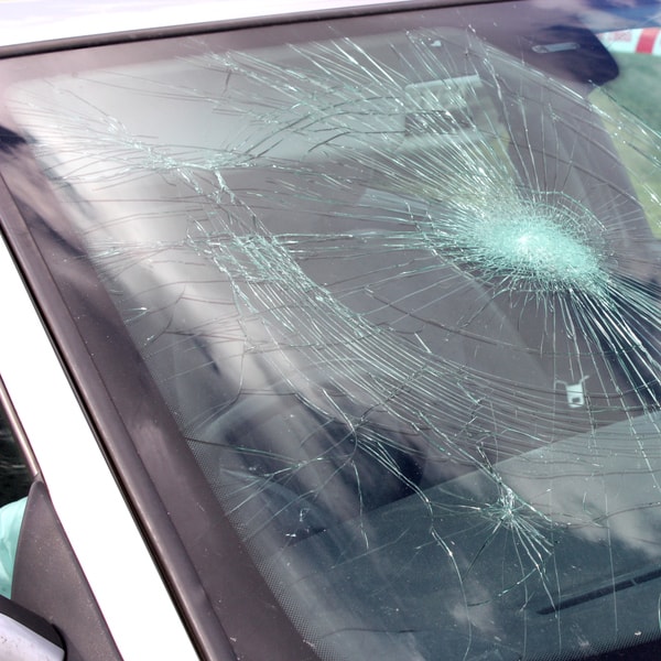 which auto glass replacement company to call and how much does it cost to fix broken windshield  in Escambia County FL